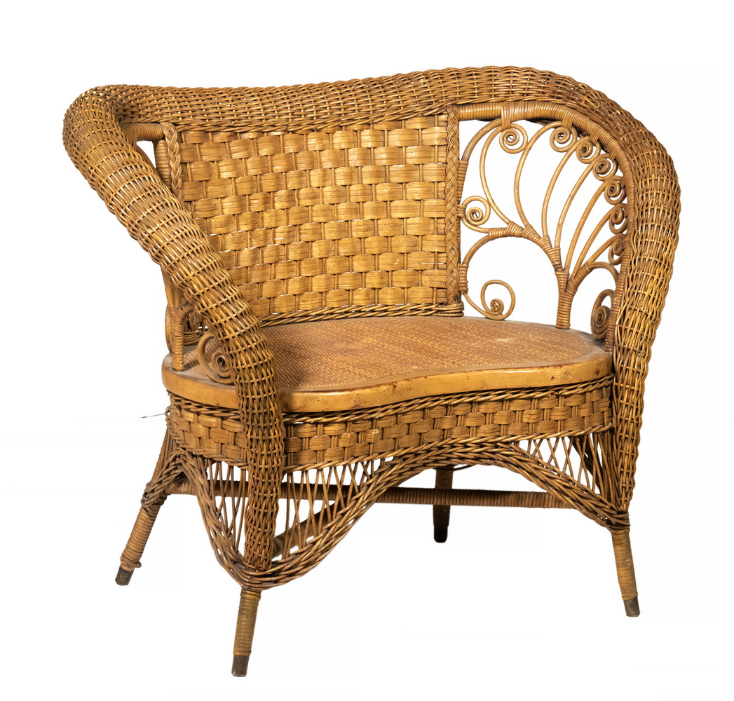 Appraisal: HEYWOOD-WAKEFIELD NATURAL FINISH FANCY WICKER LOVESEAT Two-seater with rolled arm