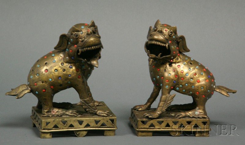 Appraisal: Pair of Bronze Foo Dogs Tibet or Nepal early th