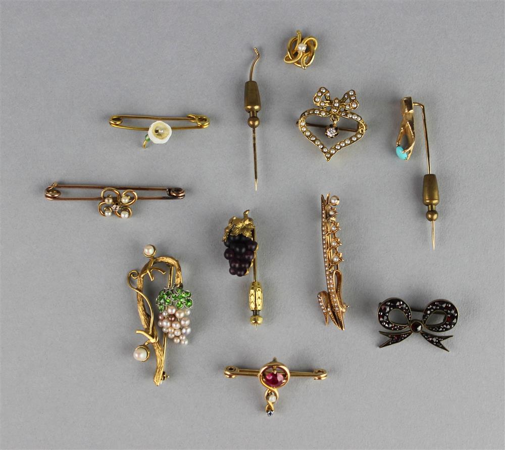 Appraisal: COLLECTION OF TEN ASSORTED GOLD AND GOLD-FILLED PINS vintage group