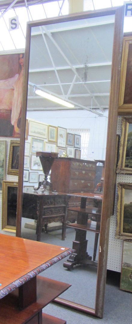 Appraisal: A large rectangular oak framed wall mirror circa with moulded