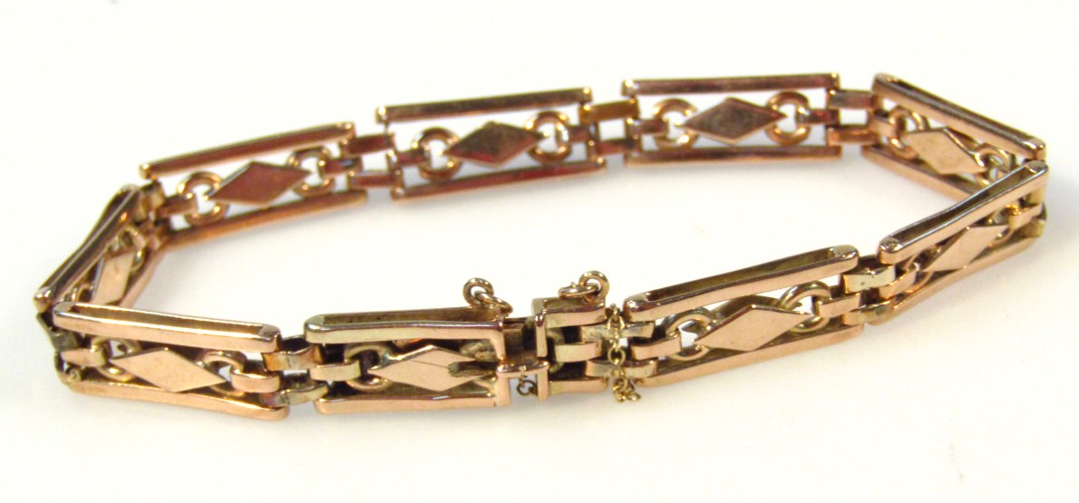 Appraisal: A gate bracelet with fancy links and plain clasp cm