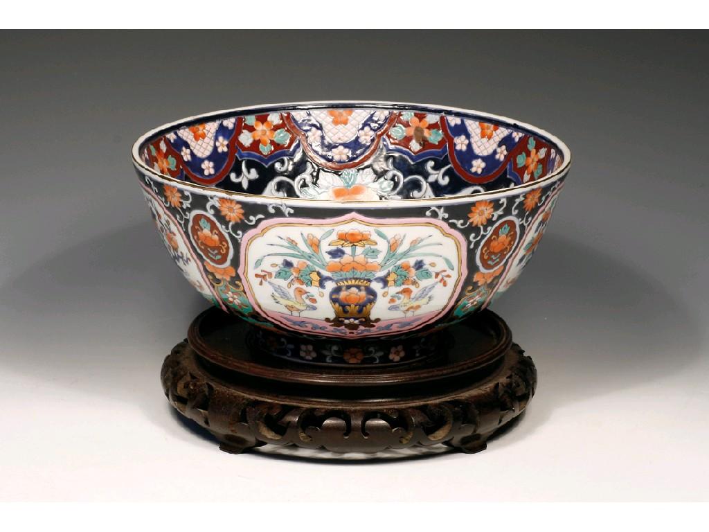 Appraisal: A CHINESE BOWL enamelled in polychrome with panels of birds