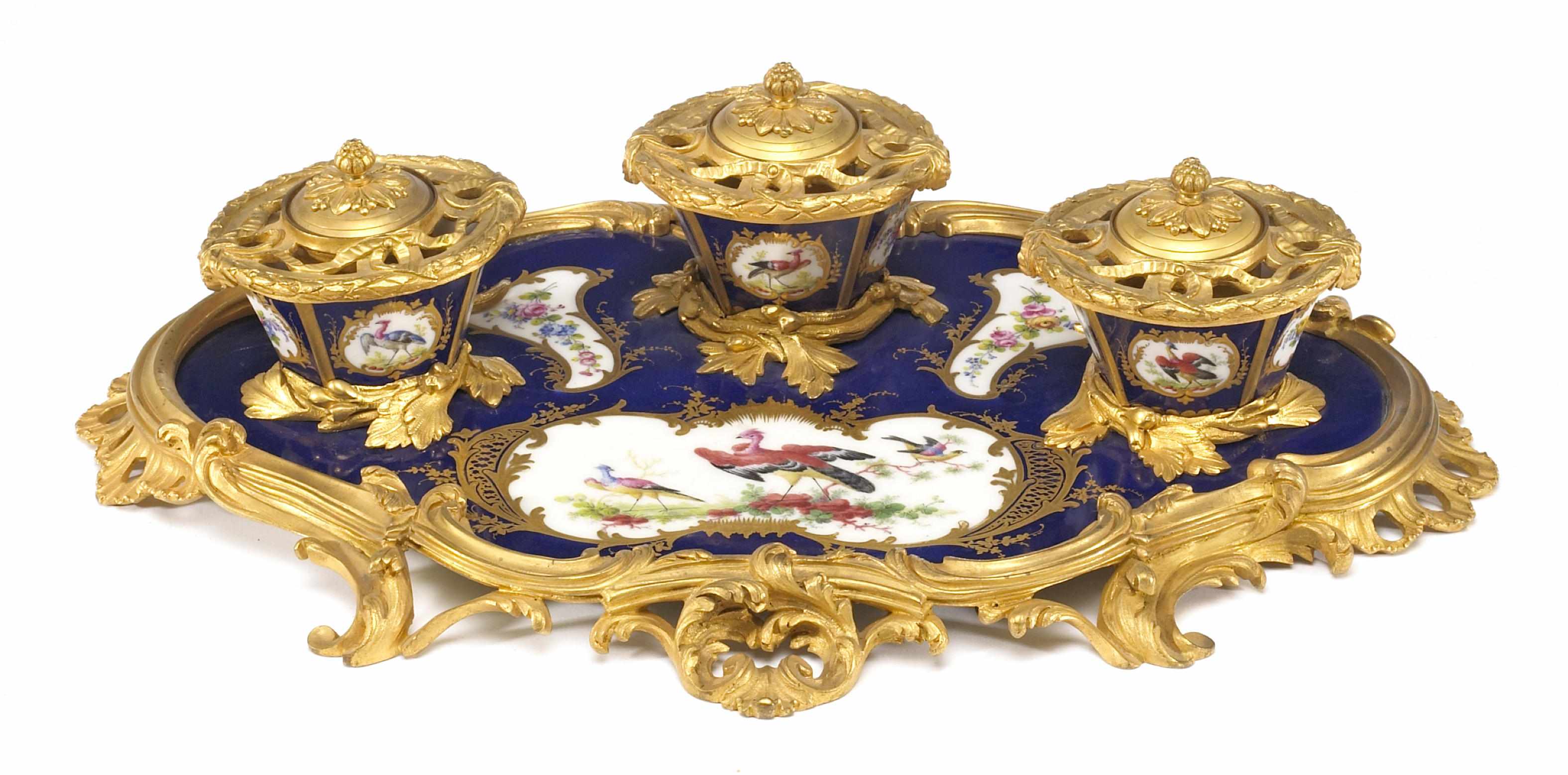 Appraisal: A Louis XV style gilt bronze mounted porcelain encrier mid