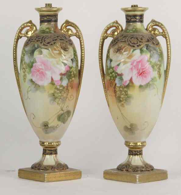 Appraisal: A pair of Noritake twin-handled vases each decorated flowers and