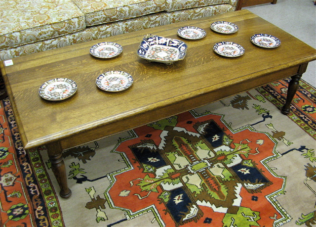 Appraisal: ANTIQUE OAK COFFEE TABLE American c having a rectangular oak