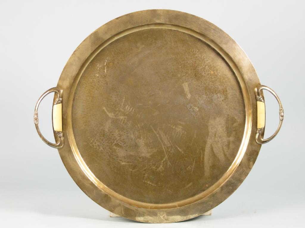 Appraisal: A George V large two handled circular Tray with hammered