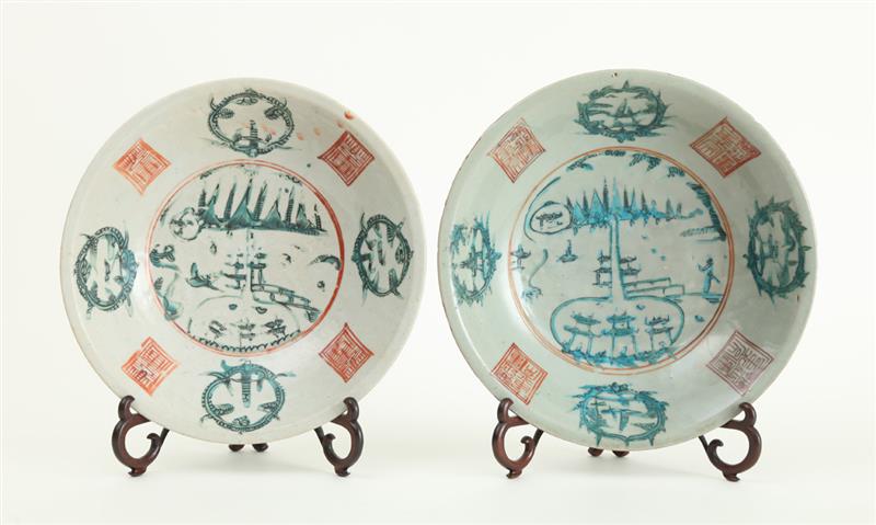 Appraisal: ASSEMBLED PAIR OF INDONESIAN CELADON-GLAZED PORCELAIN BASINS Each centered by