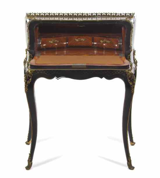 Appraisal: A Napoleon III Ebonized and Brass Inlaid Table a Ecrire