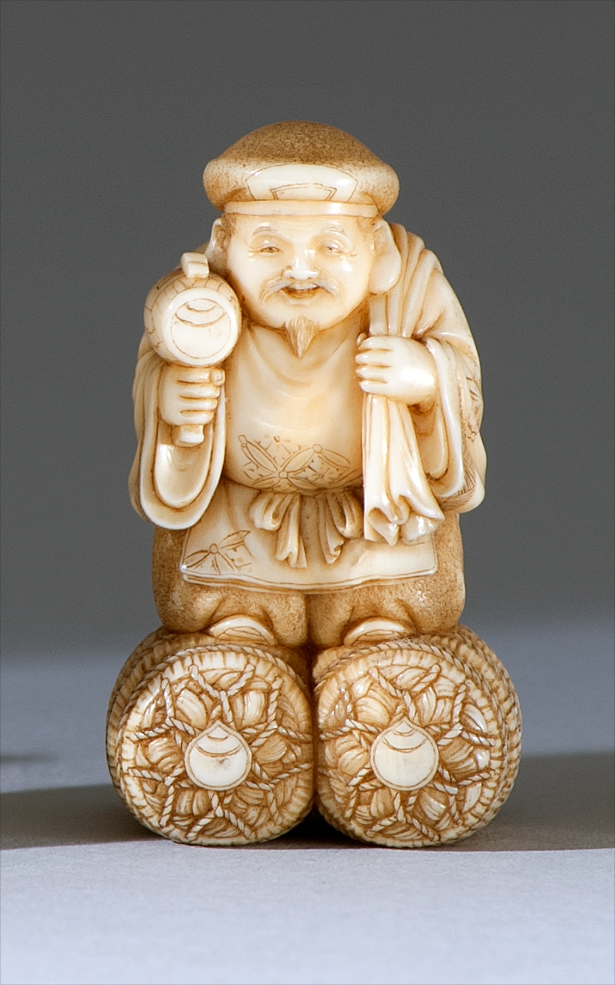 Appraisal: IVORY NETSUKE Late th CenturyBy Seiga In the form of