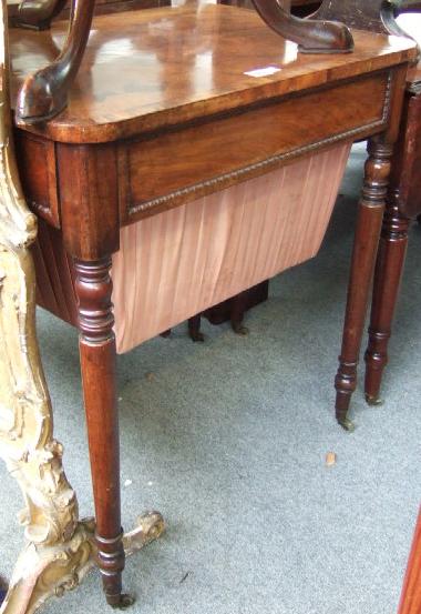 Appraisal: A George IV mahogany and rosewood banded work table