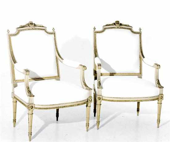 Appraisal: Pair Louis XVI style carved and painted beechwood fauteuils late