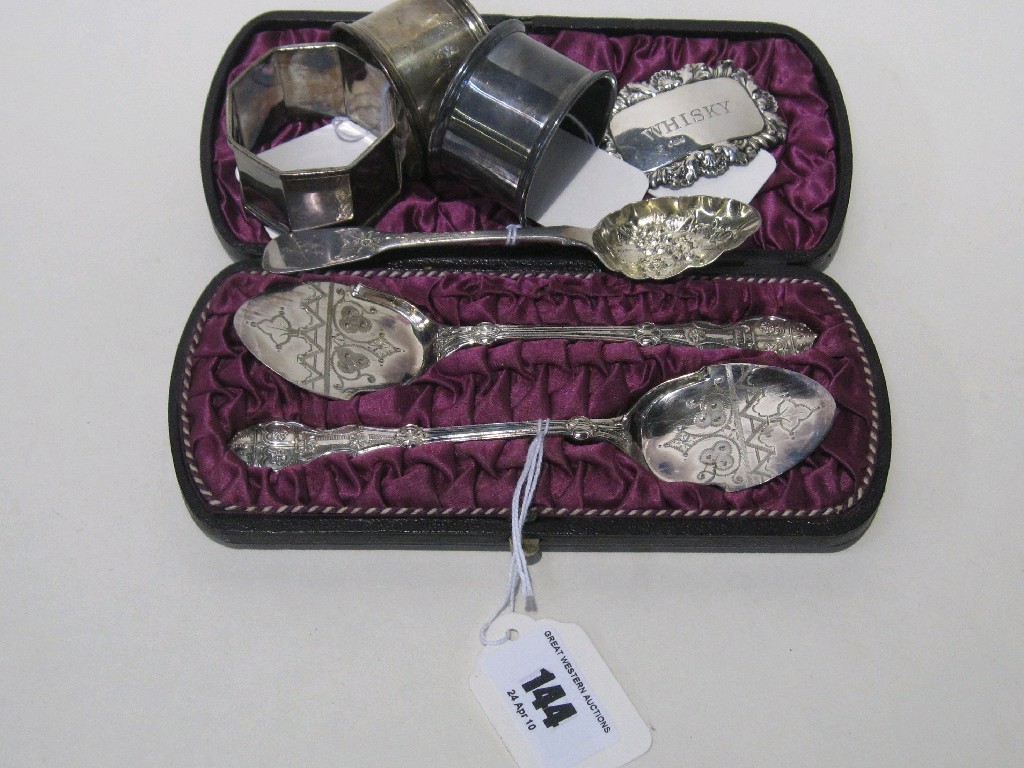 Appraisal: Lot comprising cased pair of EP spoons three silver napkin