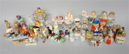 Appraisal: Large group of figural salt and pepper shakersIn the forms