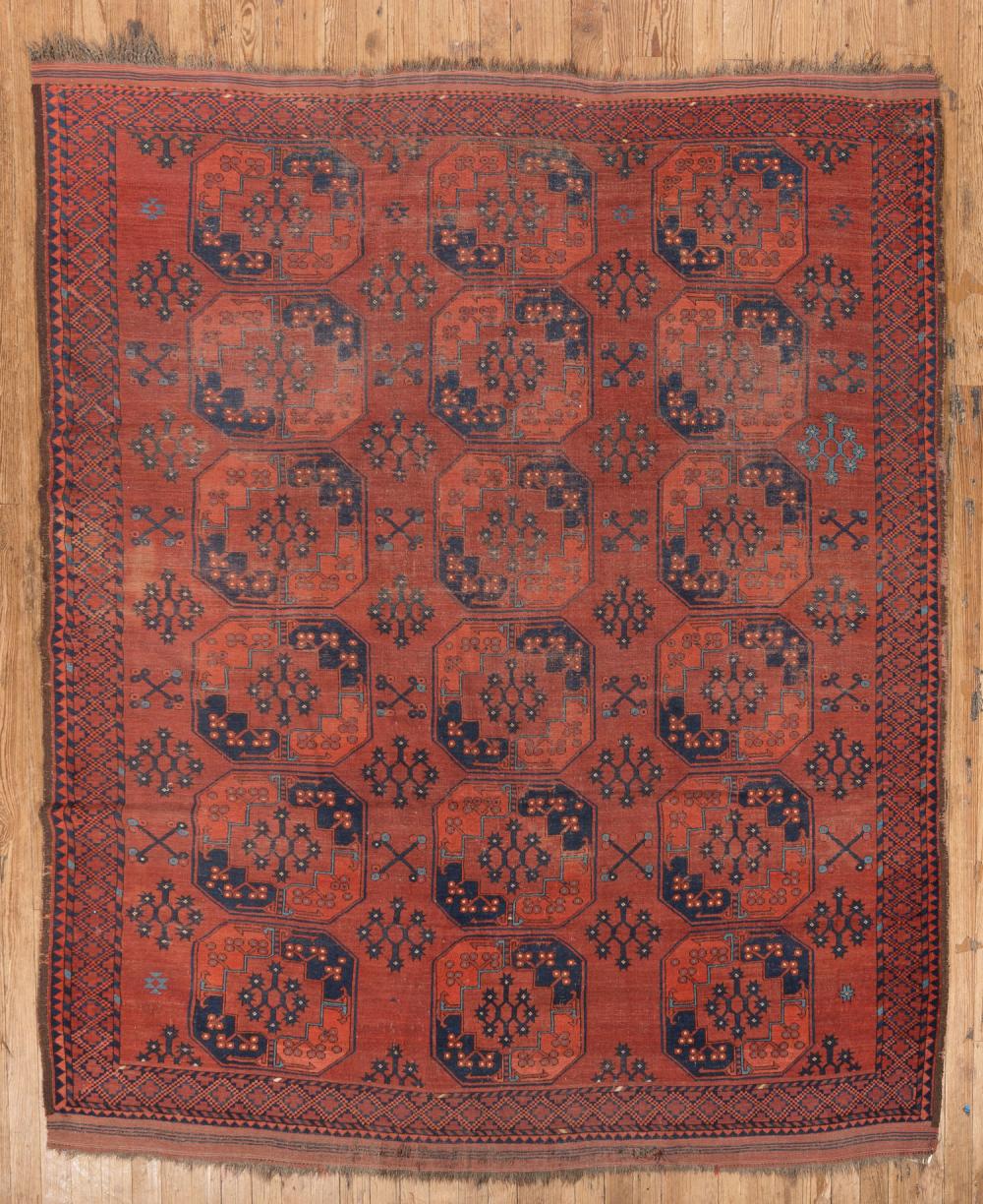 Appraisal: Antique Turkmen Carpet red ground repeating guls in red light