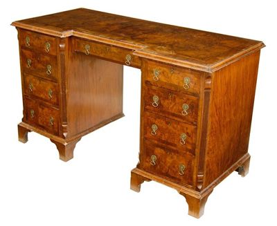 Appraisal: A late th century walnut kneehole dressing table the burr