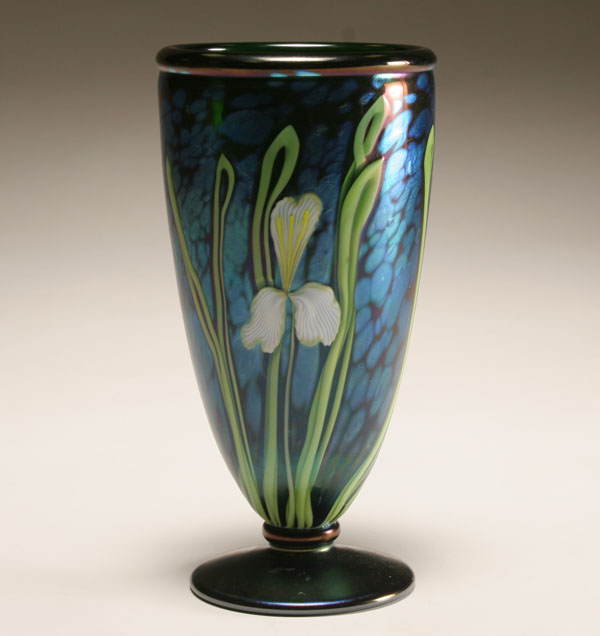 Appraisal: Orient Flume blue iridescent footed glass vase Iris pattern designed