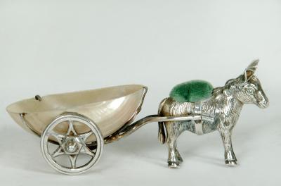 Appraisal: AN EDWARDIAN NOVELTY PIN CUSHION Birmingham modelled as a donkey