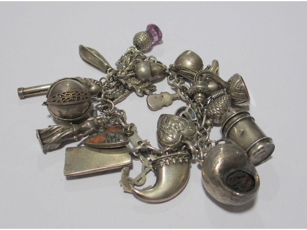 Appraisal: Victorian silver charm bracelet with twenty two various Victorian silver