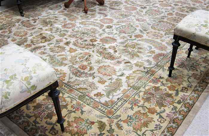 Appraisal: HAND KNOTTED ORIENTAL CARPET Indo-Persian overall floral design on light