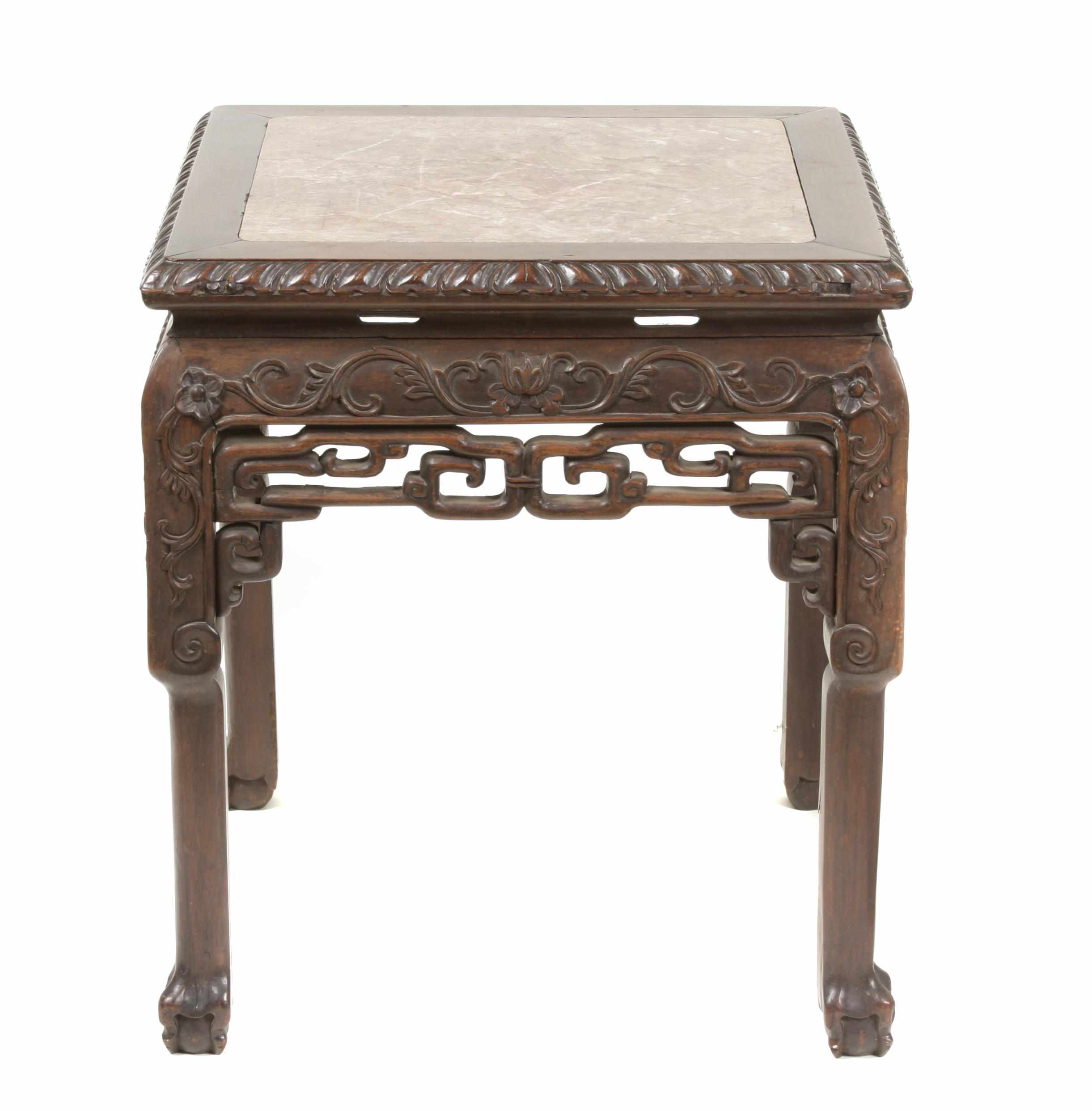 Appraisal: A Chinese carved hardwood and marble low table height in