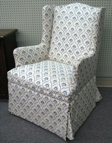 Appraisal: Full-skirted boudoir-size arm chair with blue and cream upholstery matches