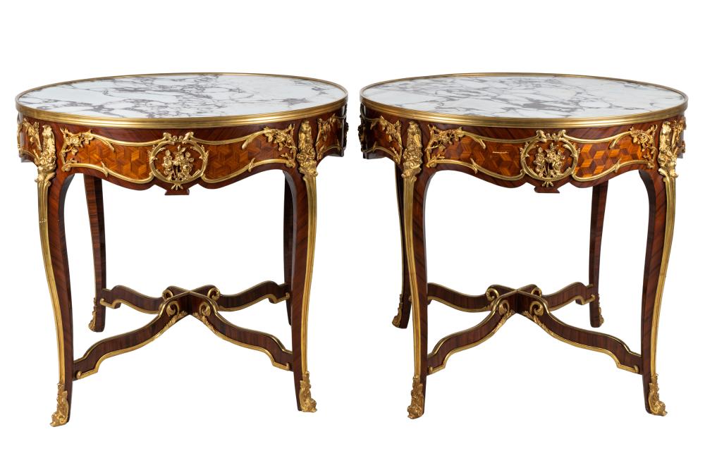 Appraisal: PAIR OF LOUIS XV STYLE MARBLE-TOP CENTER TABLESlate th early