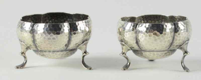 Appraisal: Pair of English Sterling Footed Salts Chester hammered finish resting