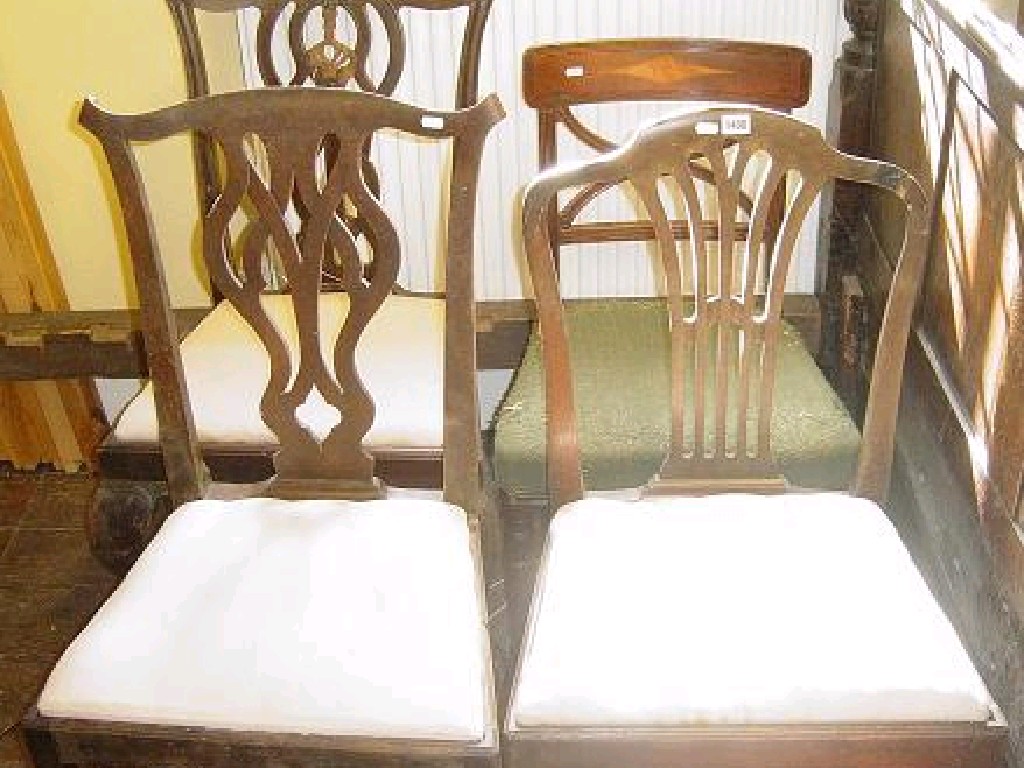 Appraisal: Two Chippendale style mahogany dining chairs with pierced interlaced central