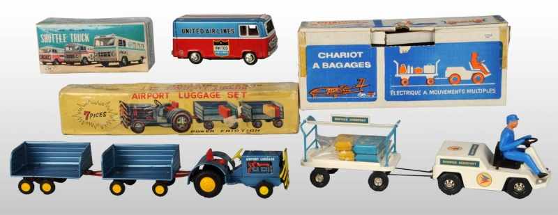 Appraisal: Lot of Tin Airport Toys Description Includes one French battery-operated