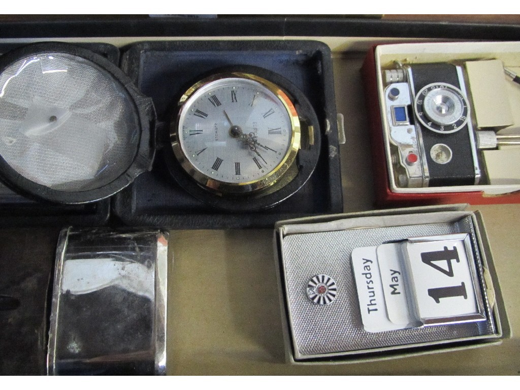 Appraisal: Box of miscellania - travel clocks lighter camera hip flask