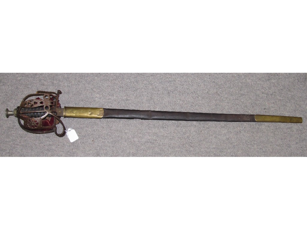 Appraisal: Officer's basket hilt sword in scabbard