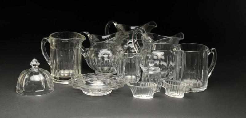 Appraisal: Lot of Heisey Glass Pieces Description Includes five pitchers one