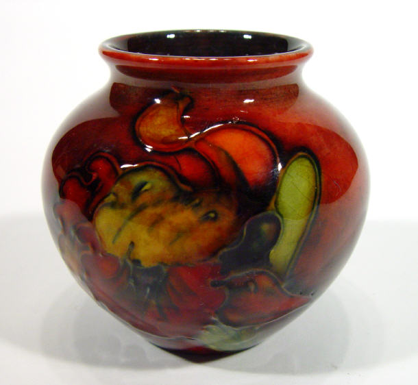 Appraisal: Miniature Moorcroft pottery vase hand painted and tubelined with orchids