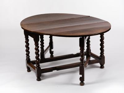 Appraisal: A late th Century oak gate-leg table with two flap