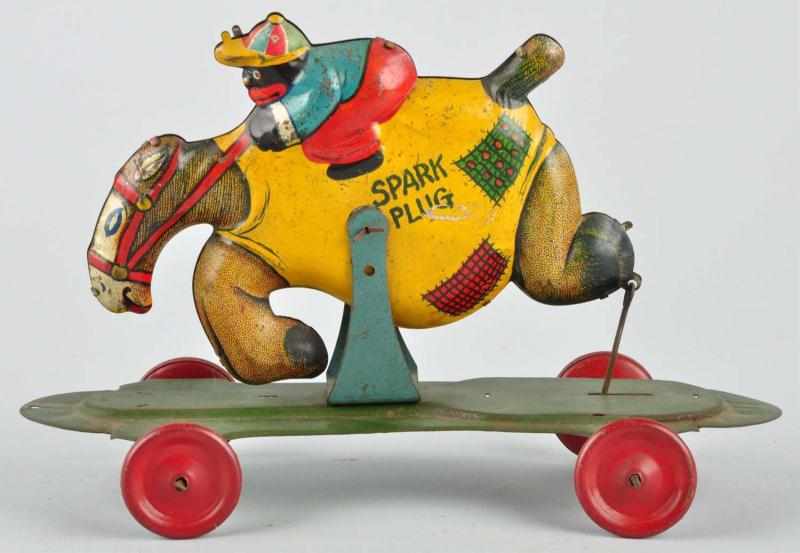 Appraisal: Tin Litho Nifty Spark Plug Platform Toy Description German Depicts