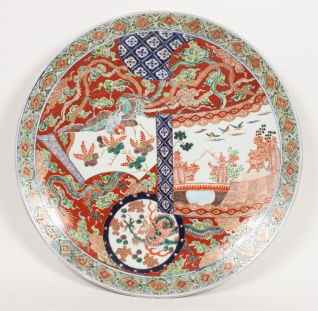 Appraisal: Japanese Imari porcelain charger mid- th century landscape dragon and