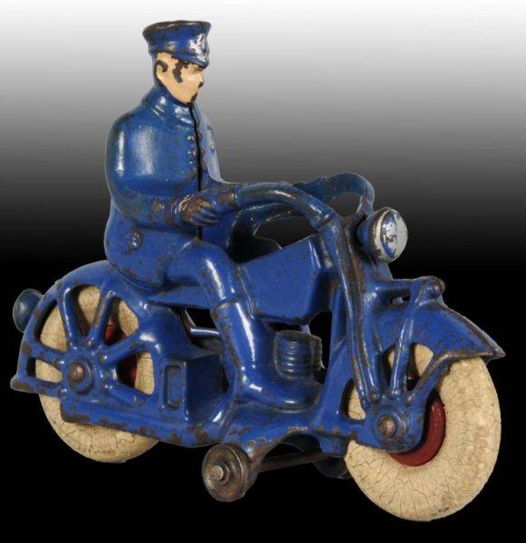 Appraisal: Arcade Cast Iron Policeman Motorcycle Toy Description Made by Arcade