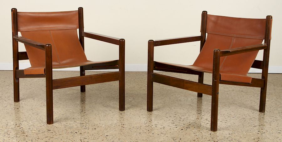 Appraisal: PAIR DANISH MAHOGANY LEATHER ARM CHAIRS A pair of Danish