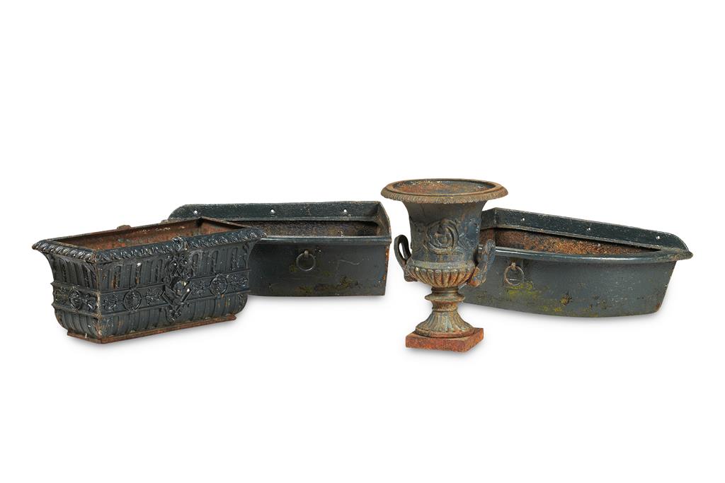 Appraisal: FOUR GREEN PAINTED CAST IRON GARDEN PLANTERS TH CENTURY comprising