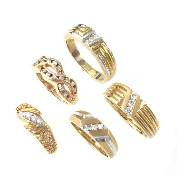 Appraisal: A collection of diamond and gold bands twenty-five bands set