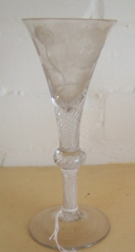 Appraisal: A Jacobite wine glass with engraved and flared trumpet bowl