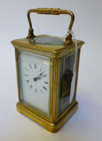 Appraisal: A BRASS CASED CARRIAGE CLOCK the twin barrel repeater movement