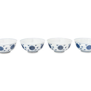 Appraisal: Four Chinese Blue and White Porcelain 'Lotus' Bowls decorated in