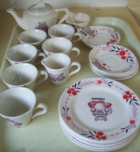 Appraisal: A child's pottery tea service for six 's decorated with