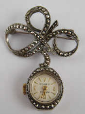 Appraisal: A silver and marcasite brooch watch London approx x cm