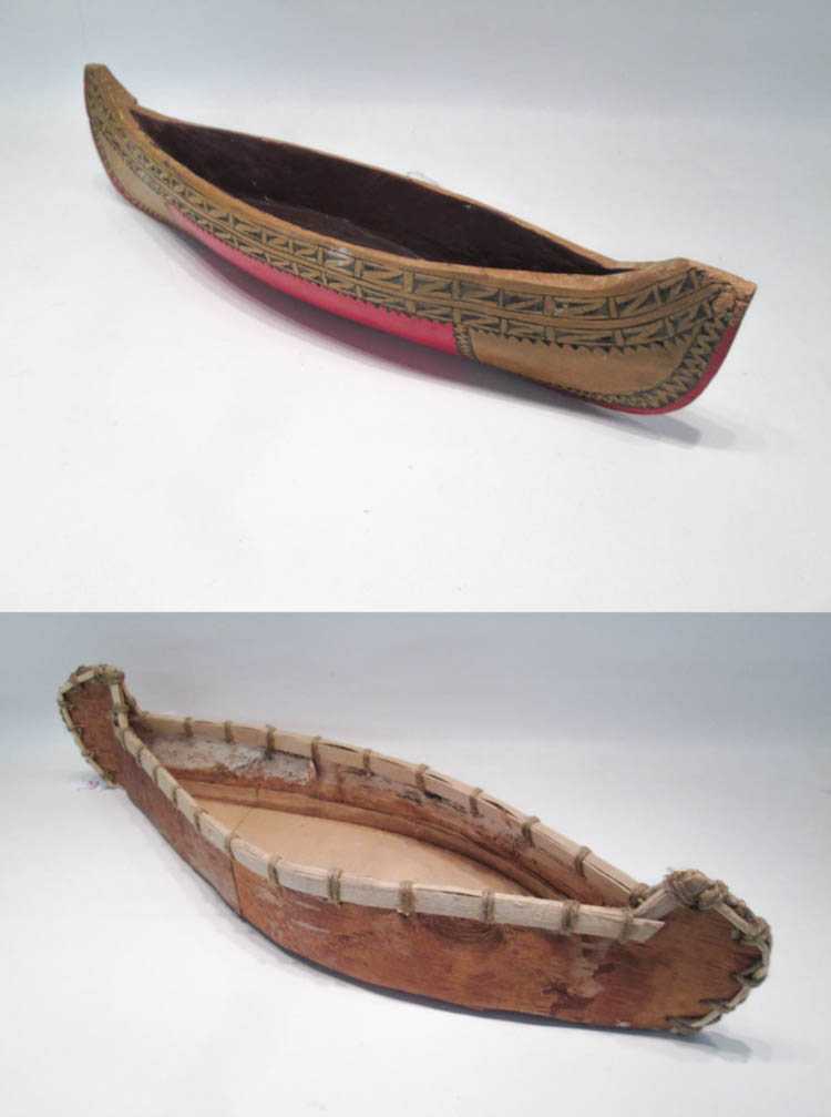 Appraisal: TWO NORTHWEST NATIVE AMERICAN CANOE MODELS the first of carved