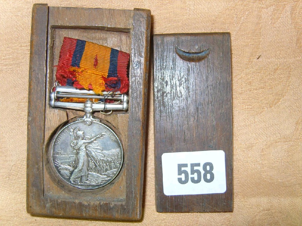 Appraisal: A wooden box containing a Queens South Africa medal second