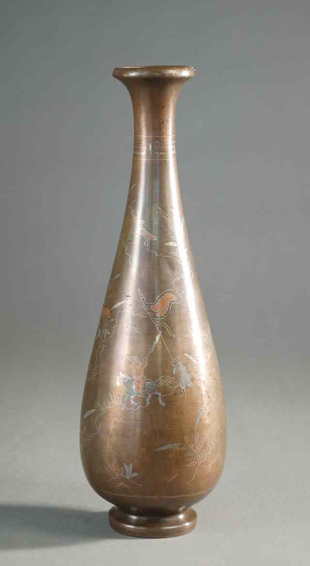 Appraisal: JAPANESE BRONZE BUD VASE with hand inlaid silver and copper