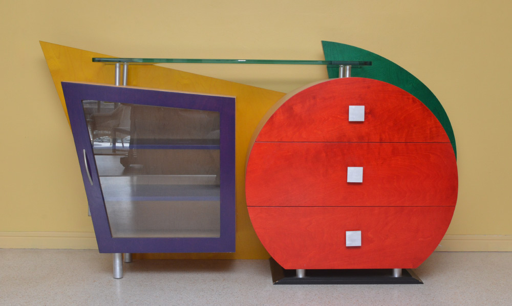 Appraisal: CONTEMPORARY GLASS TOP SIDEBOARD BUFFET Vibrant colors and shapes on