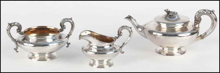 Appraisal: ENGLISH SHEFFIELD SILVERPLATE THREE-PIECE TEA SERVICE Comprised of a teapot